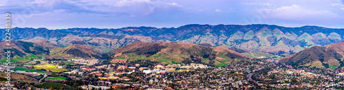 Panorama of City, Mountains from View, aerial  © Mark