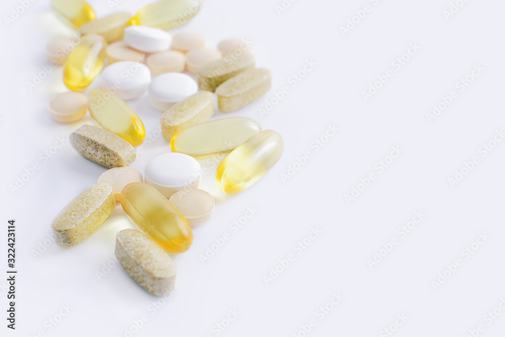 Assorted pharmaceutical medicine vitamins, pills, drugs on white background Assorted pharmaceutical medicine vitamins, pills, drugs on white background