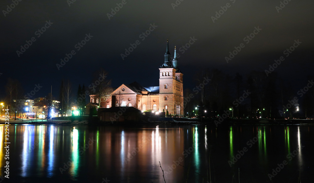 Church at night by the river