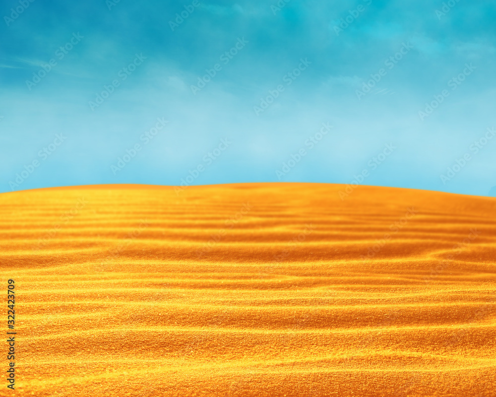 Fototapeta premium Abstract sand desert landscape with sky, sunny day blue sky. Sand dunes at sunset.