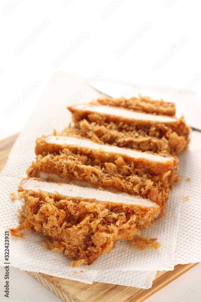 Japanese food, pork cutlet Tonkatsu on board Japanese food, pork cutlet Tonkatsu on board