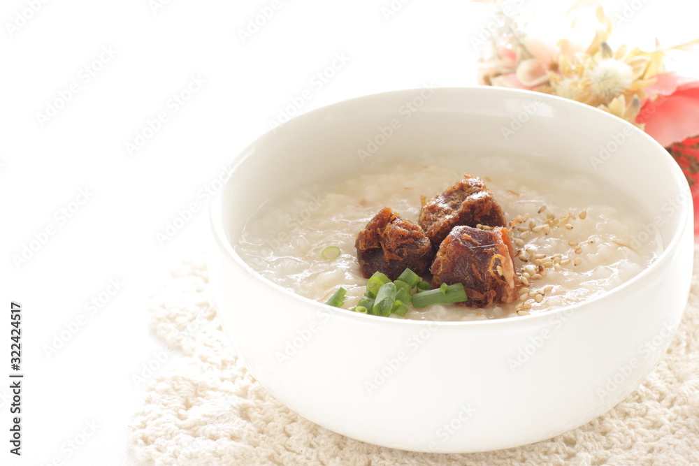 Chinese food, spicy beef jerky on rice porridge with copy space Chinese food, spicy beef jerky on rice porridge with copy space