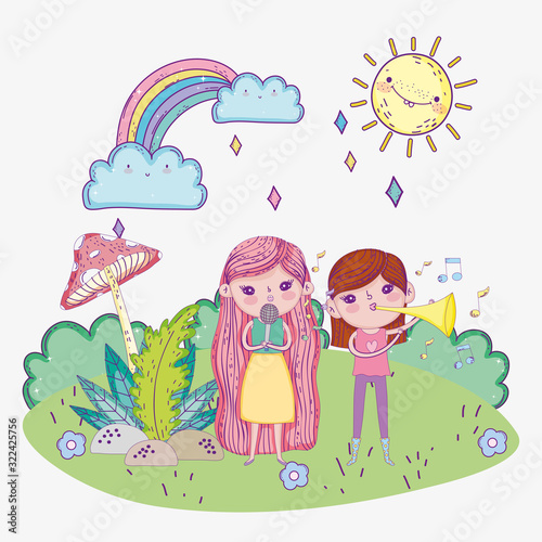 happy childrens day, girls sing with microphone and trumpet outdoors