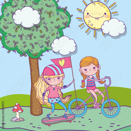 happy childrens day, cute girls riding bike and skateboard in the park