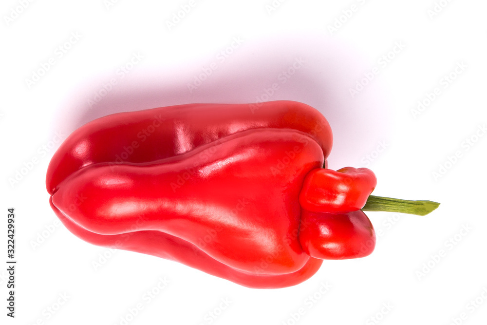 Ugly shaped organic vegetables. Deformed homegrown bell pepper isolated on white background. top view Ugly shaped organic vegetables. Deformed homegrown bell pepper isolated on white background. top view