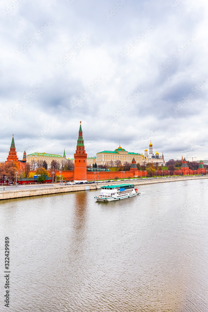 Russia Travel Destinations. Moscow Kremlin on Moskva River During Daytime. View from Bridge In Cloudy Day.