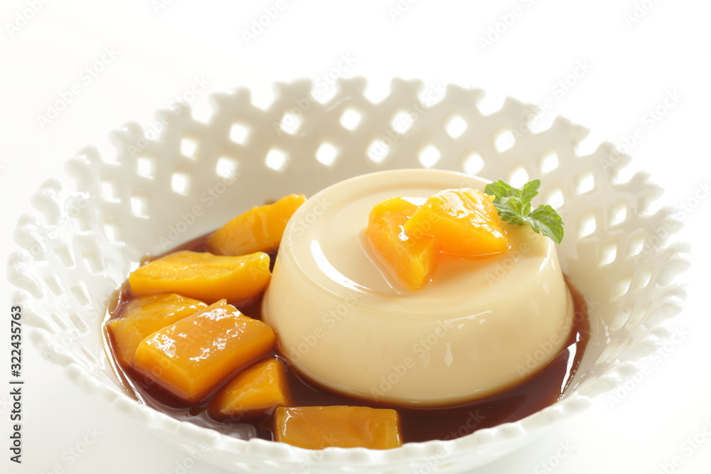 Fototapeta premium Caramel sauce and pudding with copy space