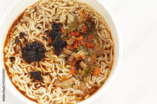 Asian food, instant noodle with seasoning in plastic container