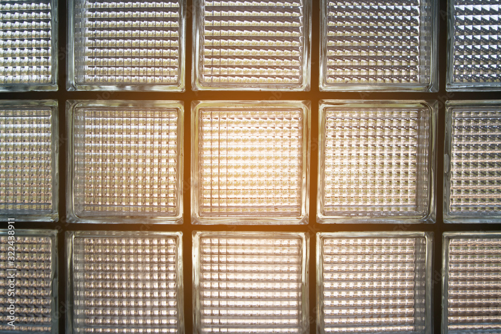 glass block wall detail texture background art in a building..