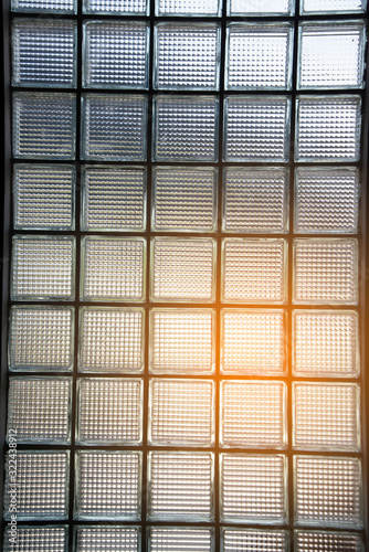 glass block wall detail texture background art in a building..