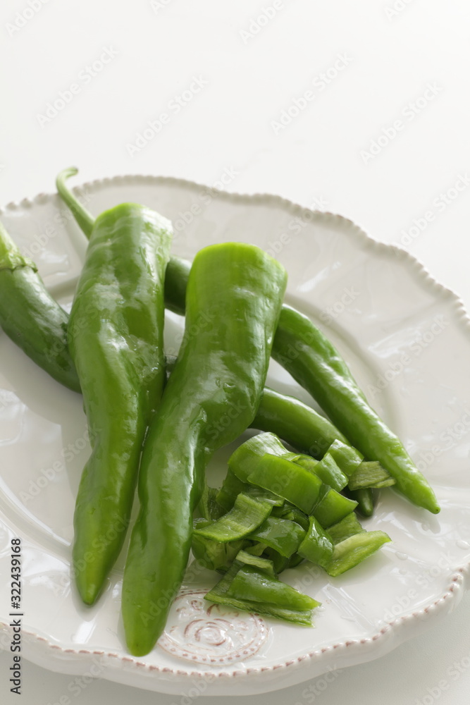 Japanese green pepper on plate for cooking image Japanese green pepper on plate for cooking image