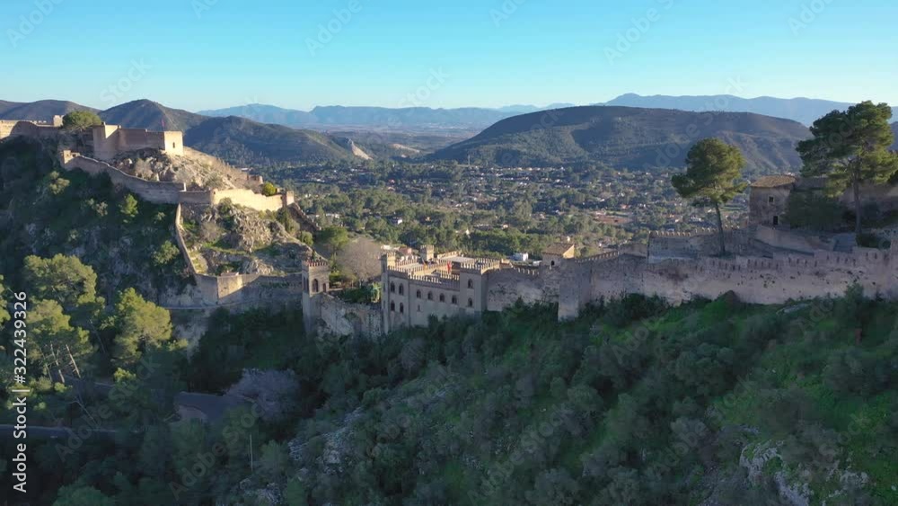Aerial view of Xativa castle located near Valencia Spain on the ancient roadway Via Augusta leading from Rome to Cartagena. Two forts connected Aerial view of Xativa castle located near Valencia Spain on the ancient roadway Via Augusta leading from Rome to Cartagena. Two forts connected