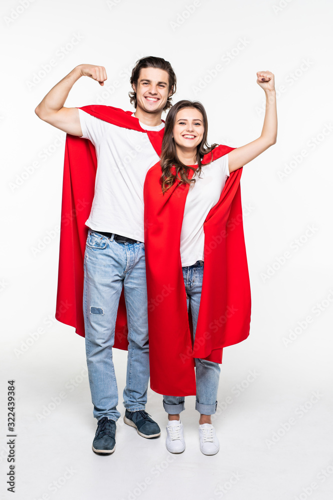 Full height Young couple wear in super hero cout show the power isolated on white background