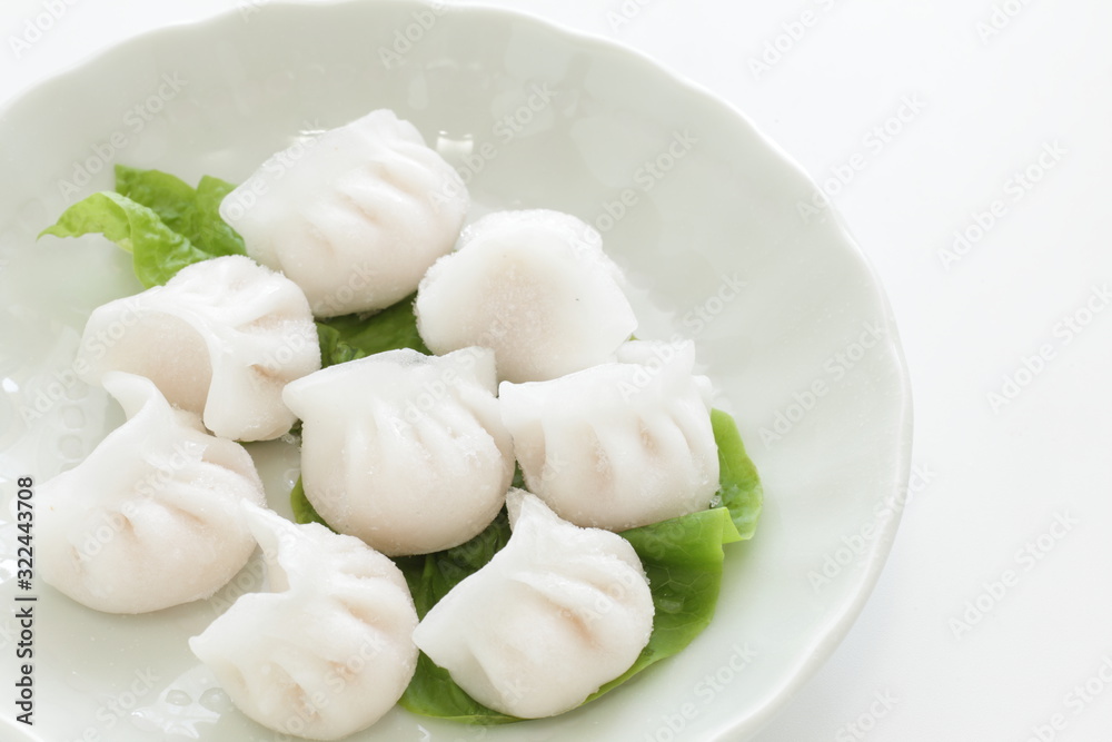 Frozen Chinese dumpling, Shrimp jiozi on dish Frozen Chinese dumpling, Shrimp jiozi on dish