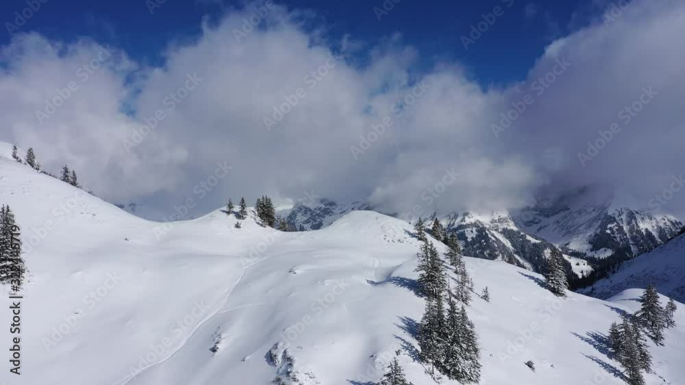The Swiss Alps in winter - flight over wonderful snow mountains - aerial photography The Swiss Alps in winter - flight over wonderful snow mountains - aerial photography