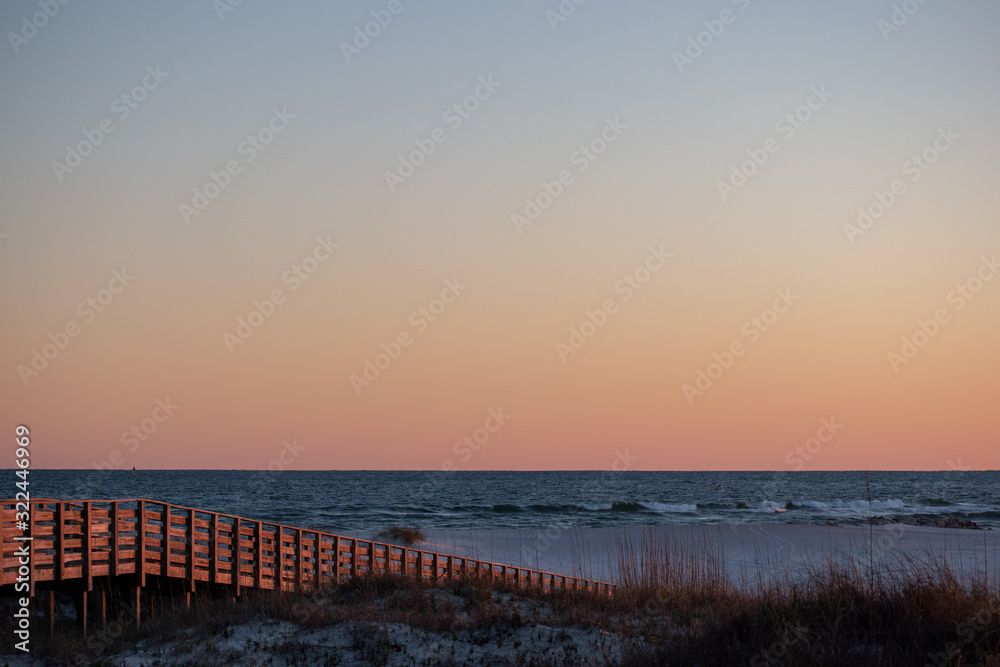 beach boardwalk sunset glow