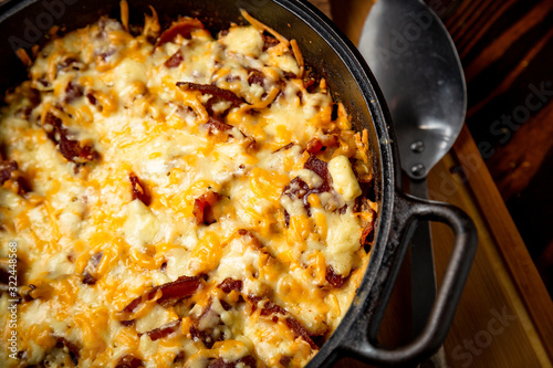 BBQ Side of Melted Mac and Cheese in a Cast Iron Bowl and Plated