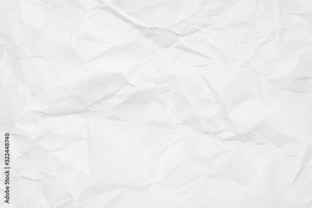 White crumpled paper texture background. Clean white paper. Top view. White crumpled paper texture background. Clean white paper. Top view.