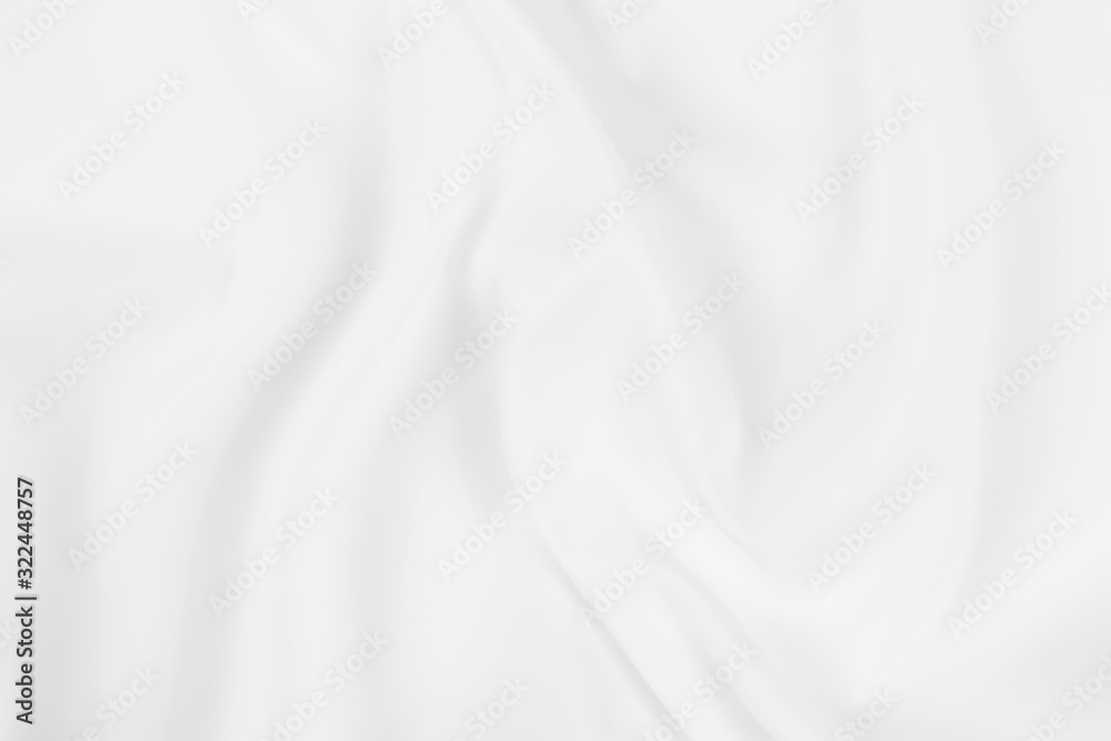 Abstract white fabric texture background. Cloth soft wave. Creases of satin, silk, and cotton. Abstract white fabric texture background. Cloth soft wave. Creases of satin, silk, and cotton.