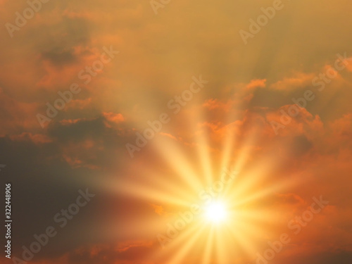 Fototapeta Naklejka Na Ścianę i Meble -  Beautiful sunset sky and clouds with dramatic light, Twilight sky and sun rays, Orange and red sky background with light of the sun-Image