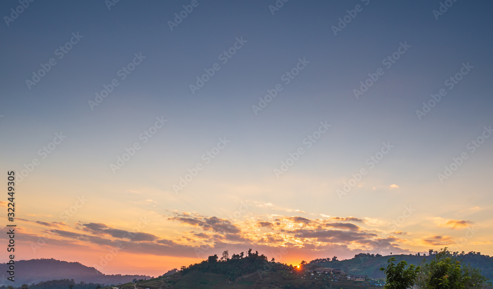 blue and sunset sky with clouds background.