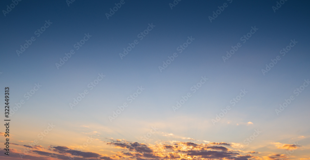 blue and sunset sky with clouds background.