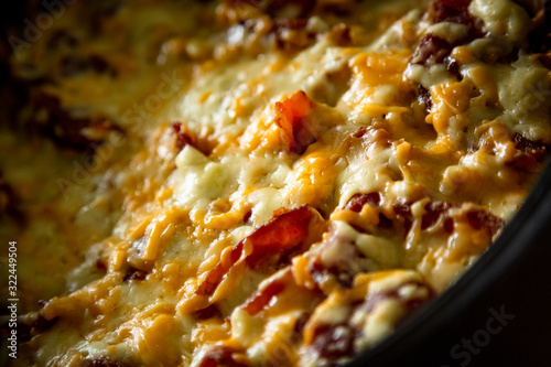 BBQ Side of Melted Mac and Cheese in a Cast Iron Bowl and Plated photo