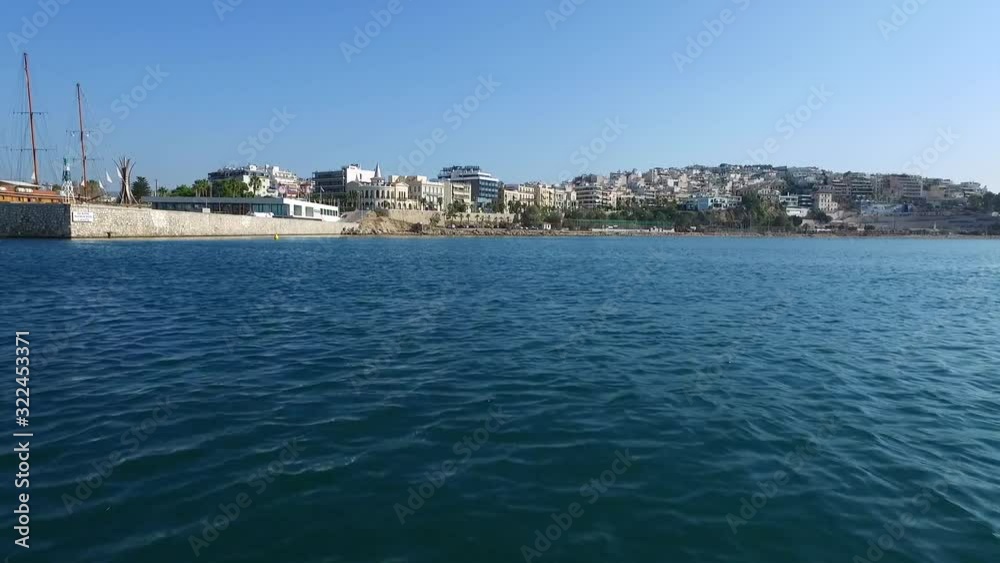 Aerial fly shot with drone very close over the sea and close to the port with a very nice sunny day and blue sky. Aerial fly shot with drone very close over the sea and close to the port with a very nice sunny day and blue sky.