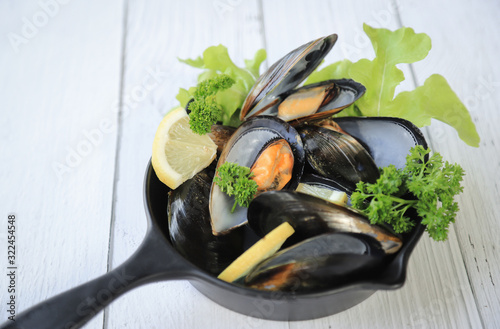 cooked mussel salad in pan for eating 