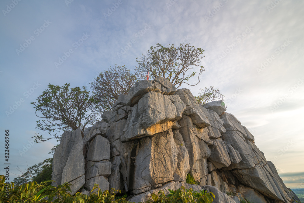 Fototapeta premium The scenery of the limestone cliff at the peak of Khao Nor in the morning at Nakhon Sawan, Thailand.