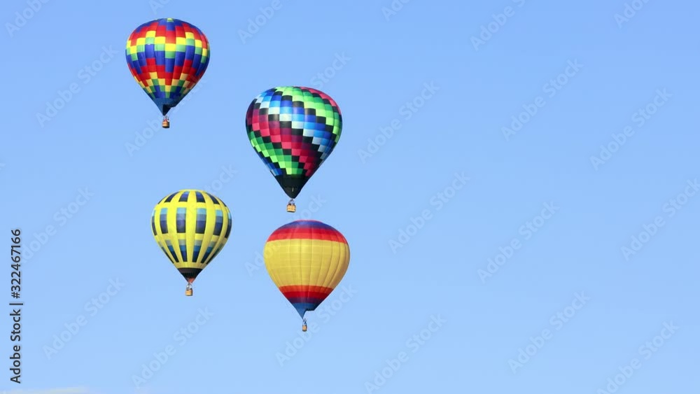 Colorful hot air balloons in clear blue sky, 4k Colorful hot air balloons in clear blue sky, 4k
