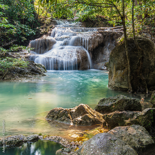 Mountain waterfall in the evening sun