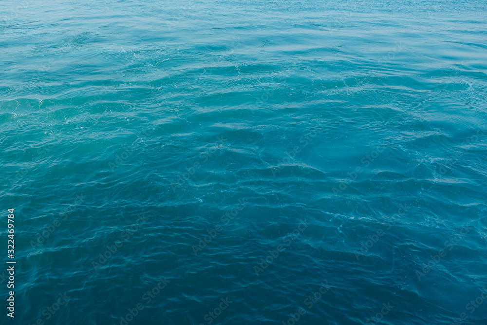 Blue sea surface with waves abstract background pattern Blue sea surface with waves abstract background pattern