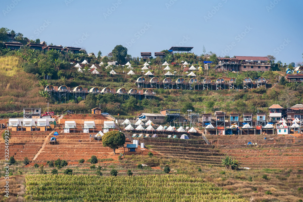 Chiang Mai , Thailand - January, 18, 2020 : Landscape of accommodation in the mountains from Doi Mon Jam in Chiang Mai and Tourist Attractions Northern of Thailand Chiang Mai , Thailand - January, 18, 2020 : Landscape of accommodation in the mountains from Doi Mon Jam in Chiang Mai and Tourist Attractions Northern of Thailand