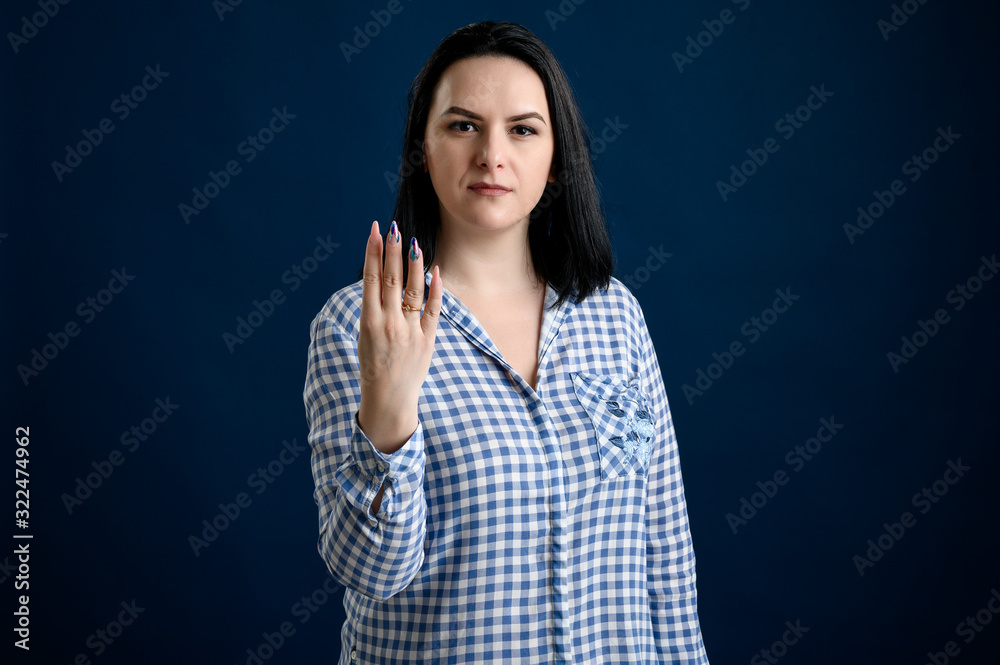 Young woman showing number four Young woman showing number four