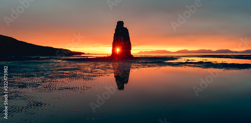 Fototapeta Naklejka Na Ścianę i Meble -  Picturesque landscape with famous Hvitserkur rock and dark sand after the tide. Vatnsnes peninsula, Iceland, Europe