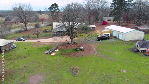 [AERIAL] Winter Tree Surrounded by Ranch photo