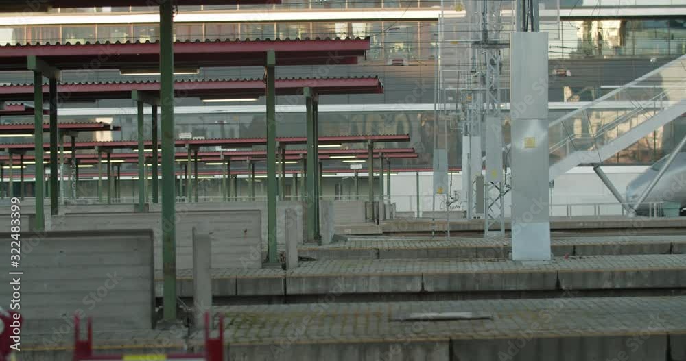 Wide shot with slow parallax motion of gray modern public transport commerce train from Wide shot with slow parallax motion of gray modern public transport commerce train from
