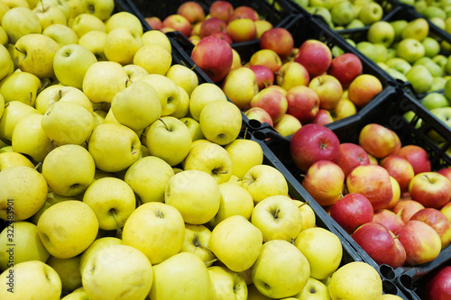 Bunch of organic fresh apples on a market