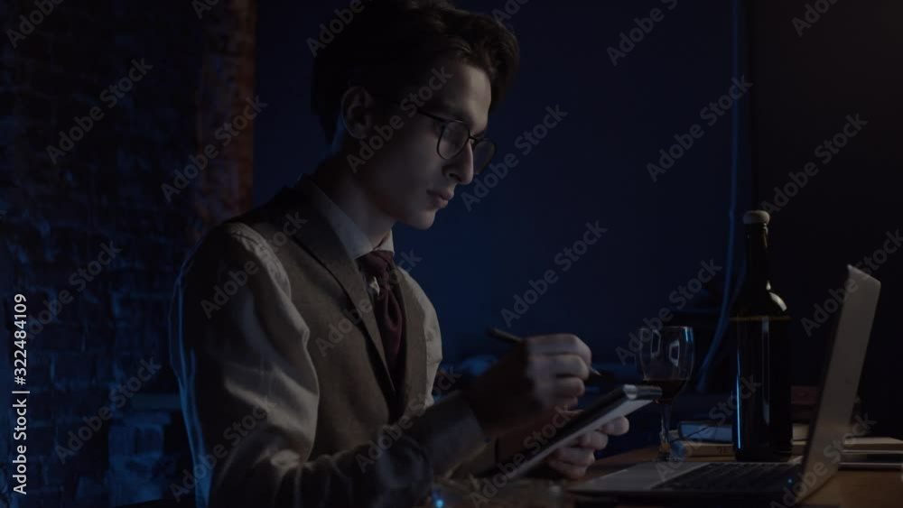 Young man working with laptop, slow motion Young man working with laptop, slow motion