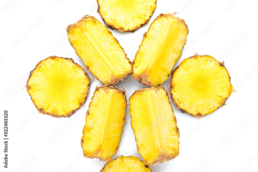 Pieces of fresh pineapple on white background