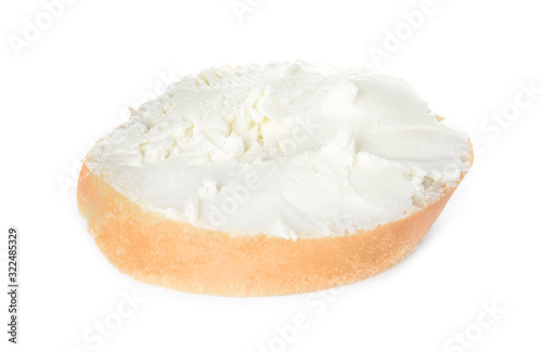 Slice of tasty bread with cream cheese on white background