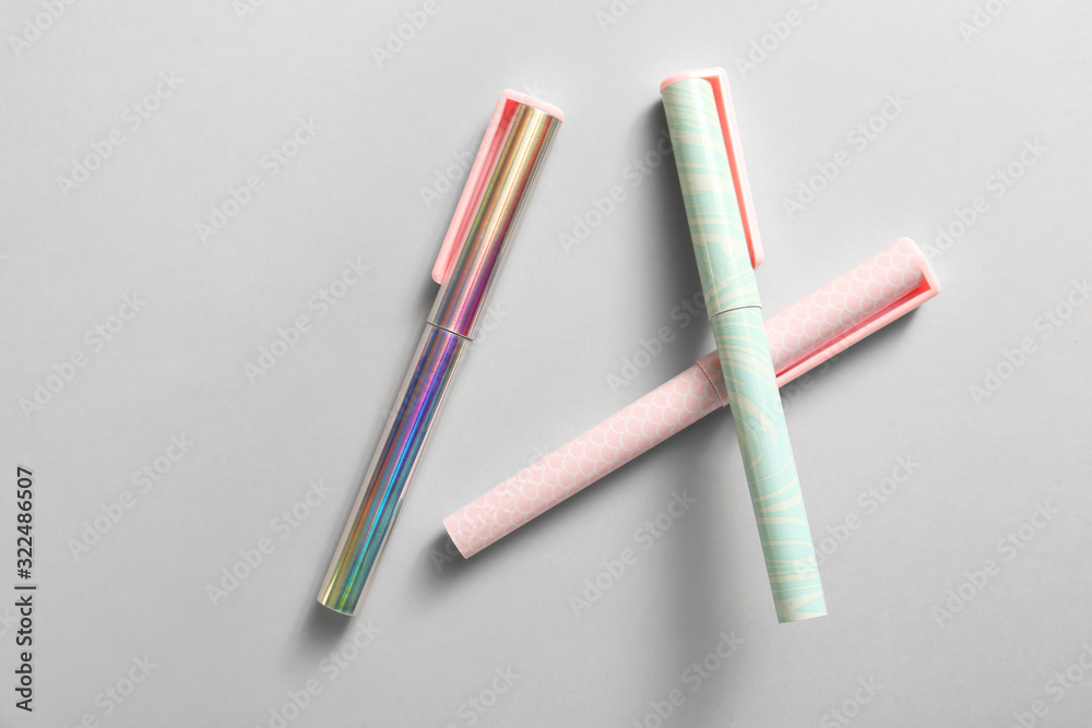 Different pens on grey background Different pens on grey background