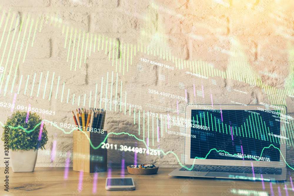 Naklejka premium Double exposure of chart and financial info and work space with computer background. Concept of international online trading.