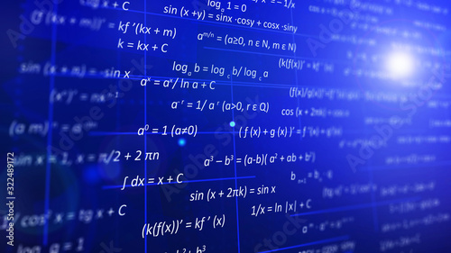 Algebra concept. The blue screen shows the basic formulas of modern mathematics.