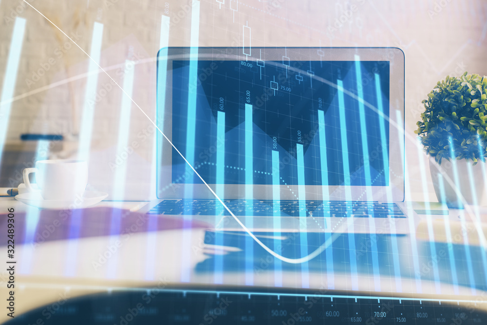 Forex market chart hologram and personal computer background. Double exposure. Concept of investment.