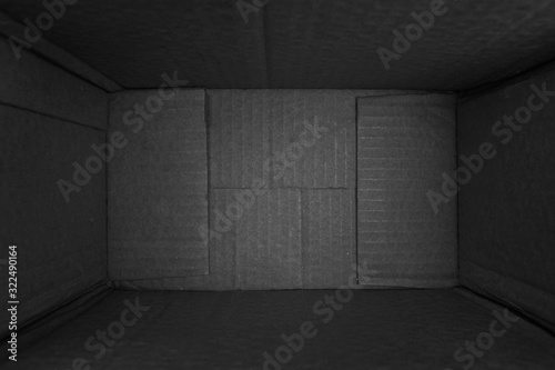 Empty black cardboard box background texture top view down