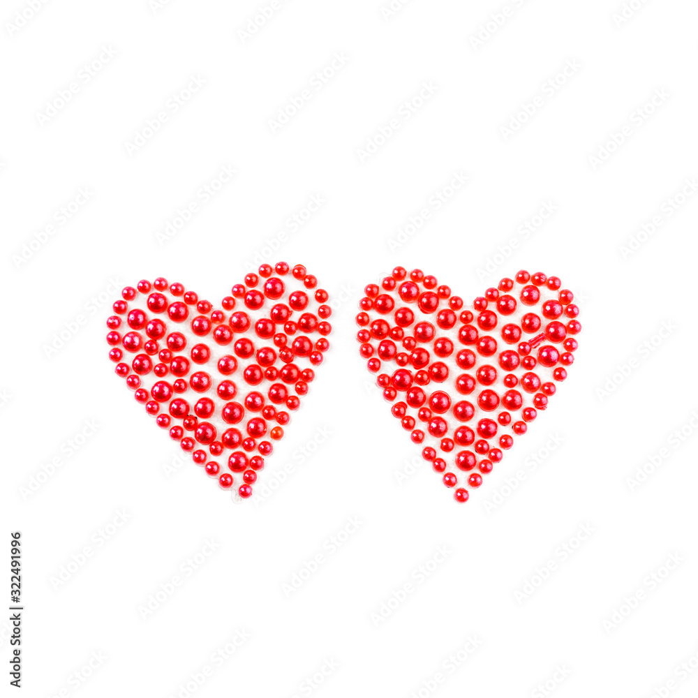 Two red hearts. Decorative stickers on bright background.