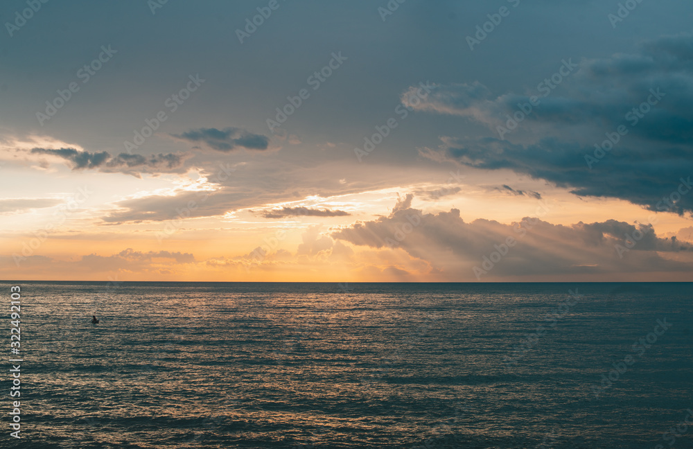 Sea horizon line and sunset photo.
