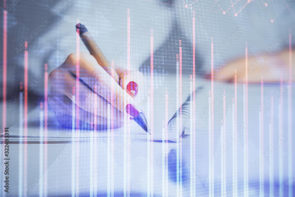 Double exposure of woman's hands making notes with forex graph hologram. Concept stock market analysis. Double exposure of woman's hands making notes with forex graph hologram. Concept stock market analysis.